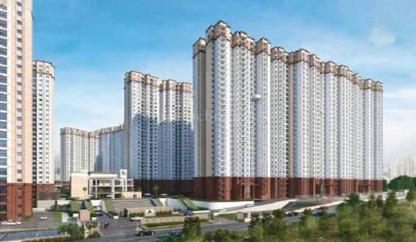 Sarjapur Road property price 2026 — apartment towers along the corridor
